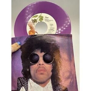 T4-72 PRINCE AND THE REVOLUTION When Doves Cry - PURPLE VINYL - 1984 - 7-29286